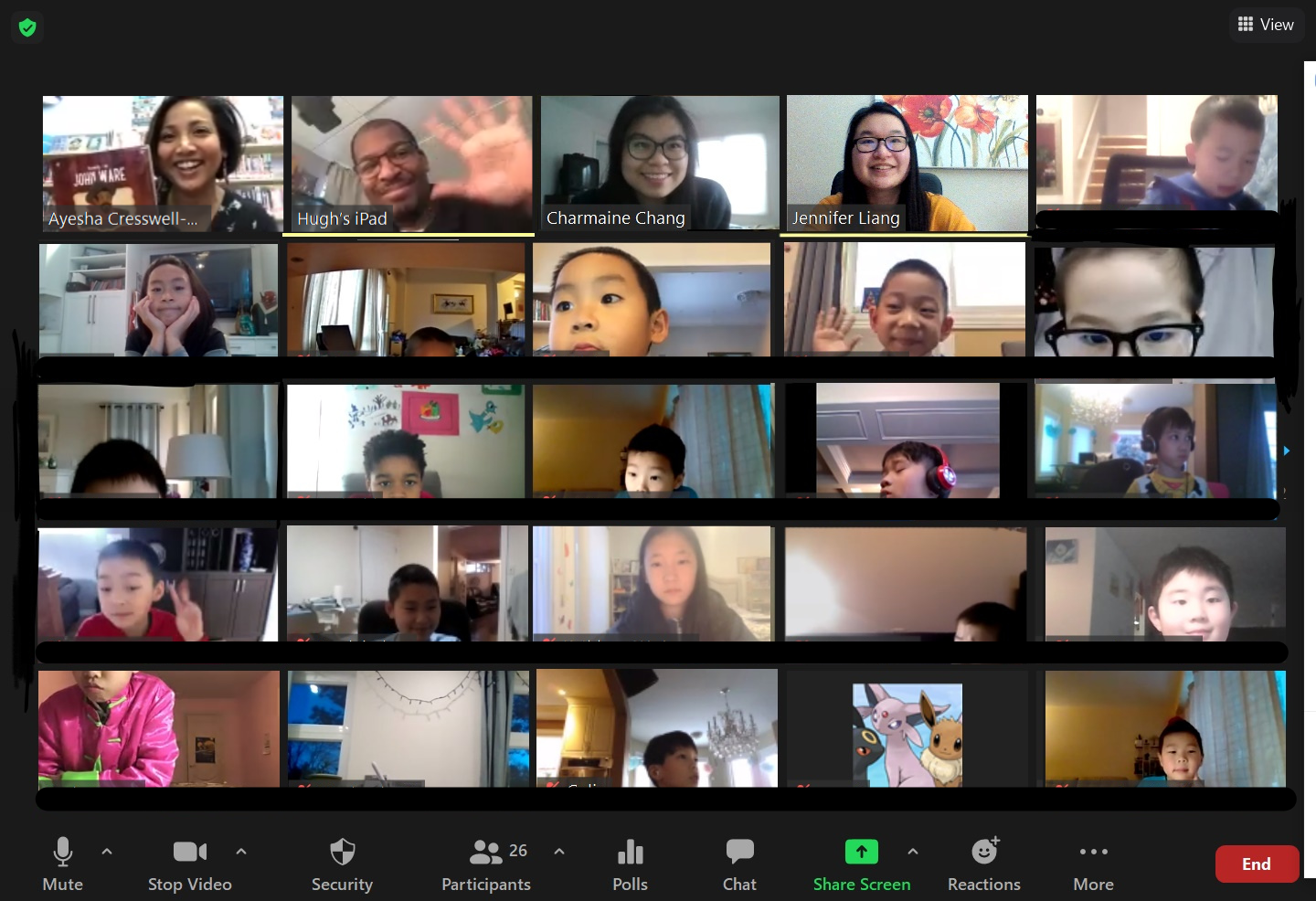 Zoom meeting with several children and several adults. One adult holds a book.